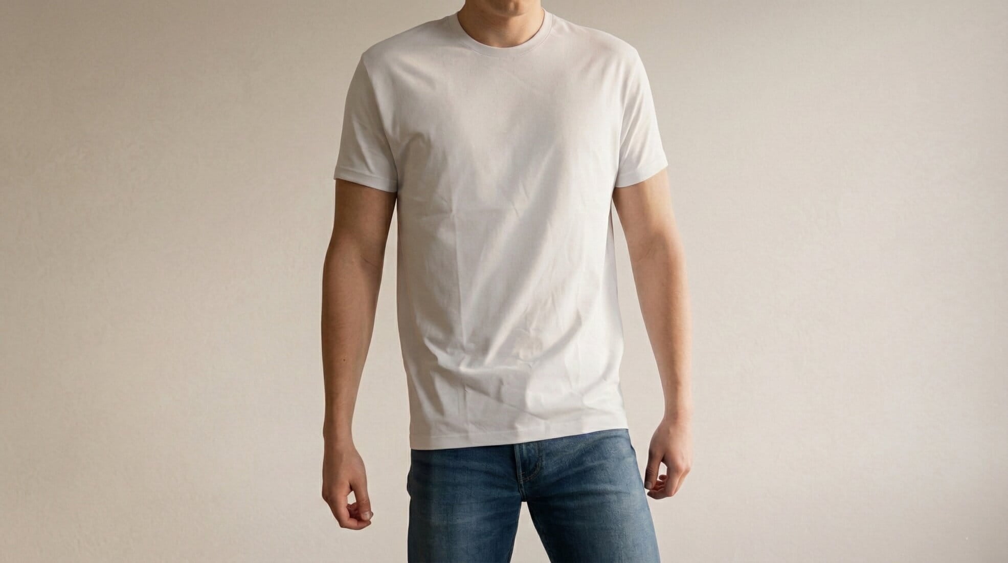 man wearing a basic white premium t-shirt regular fit posing on natural background